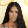 Kim Kardashian's Midriff Tease in Black Crop Top Sets Social Media on Fire!